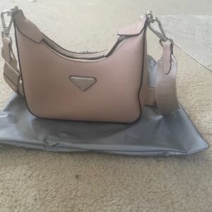 Pale pink Prada purse